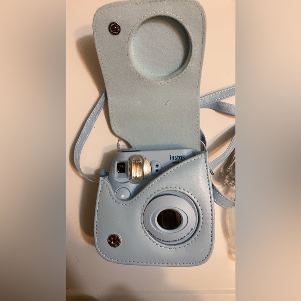 Light blue Instax mini Polaroid
